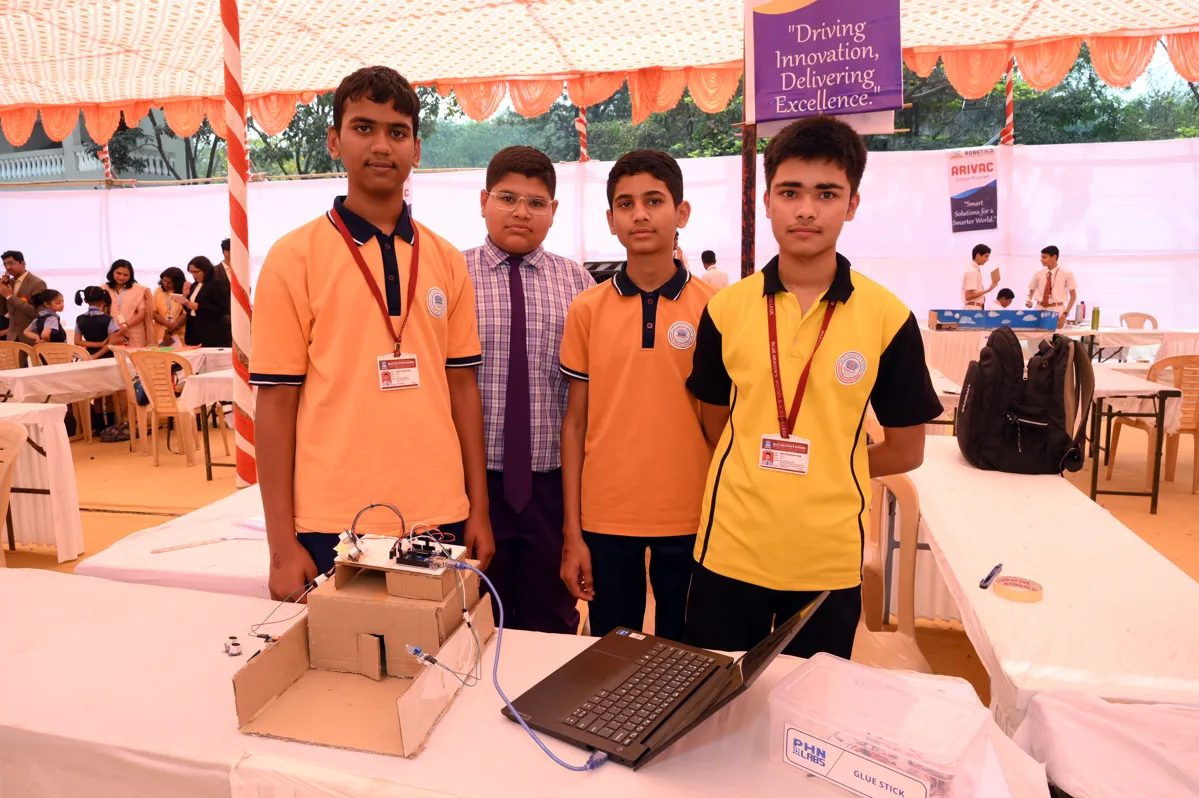 Students presenting robotics project